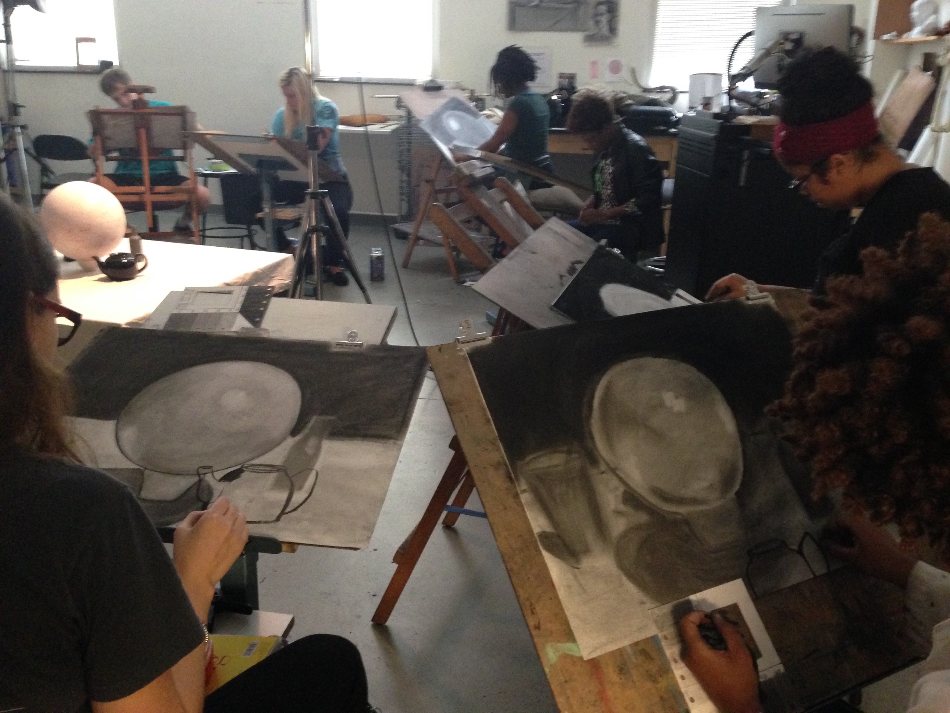 Drawing classroom with students working on a simple value study