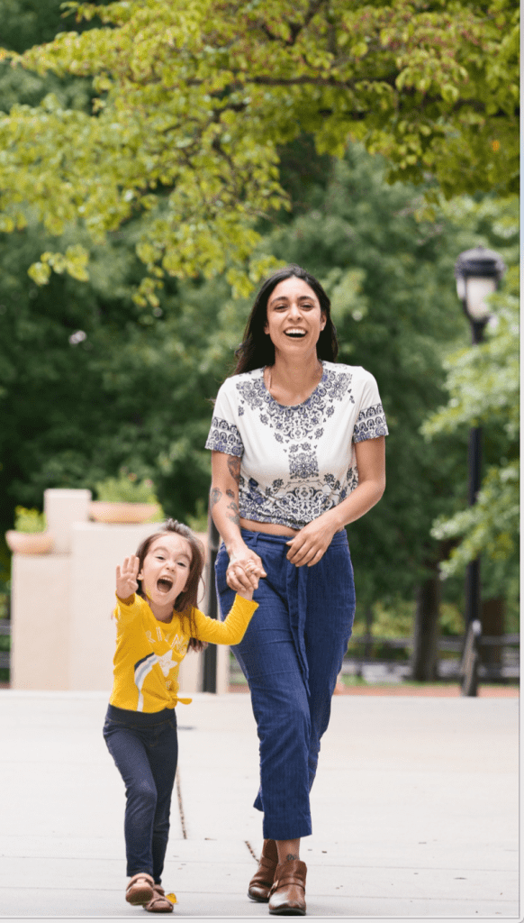 mother walking with her daughter on campus