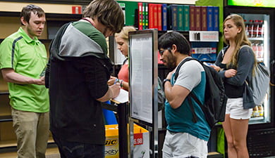 students in line at campus bookstore during first day of classes