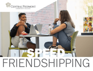 two friends chat comfortably together on campus at a table