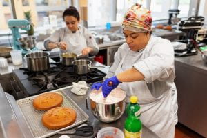 Baking and Pastry Arts student making a cake