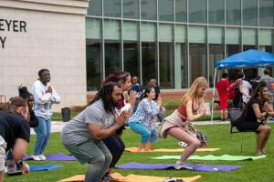 Counseling on the Green yoga with students